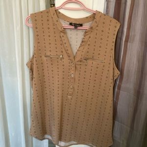 Tan coloured with small pattern, tank top.